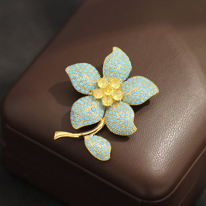 Dainty blue stone cubic zirconia brooch pin for women, fashionable women fashion jewelry, classic coat brooch, perfect anniversary gift for her and bridal wedding jewelry.